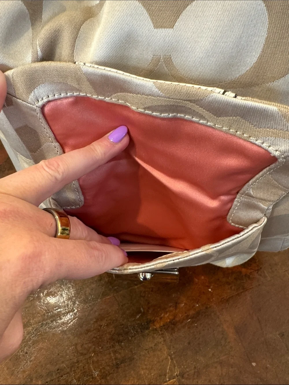 Coach Beige Signature Hobo Bag with Turn-Lock Pocket